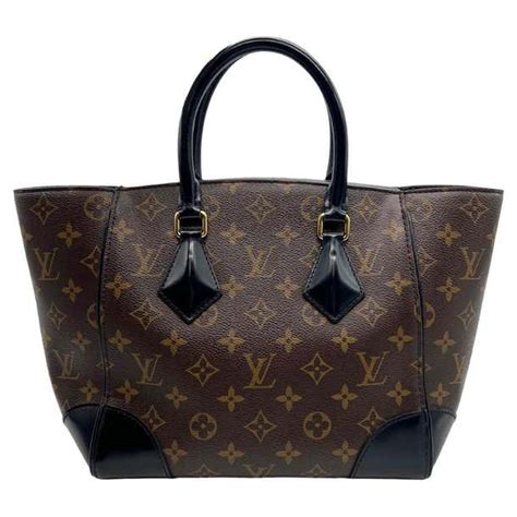 Louis Vuitton Monogram Phenix PM .